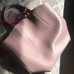 Pink leather handbag